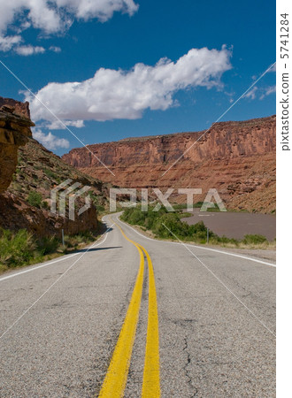 vibrant image of highway and blue sky vibrant image of highway and blue sky 5741284