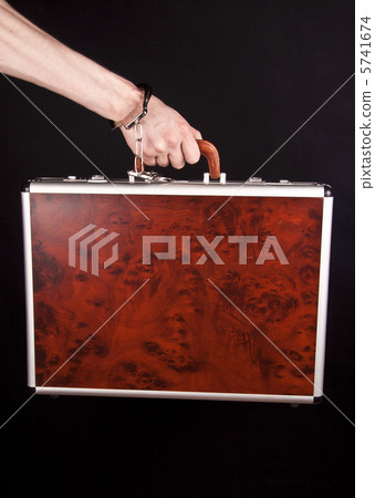 Hand man with a red briefcase Hand man with a red briefcase 5741674