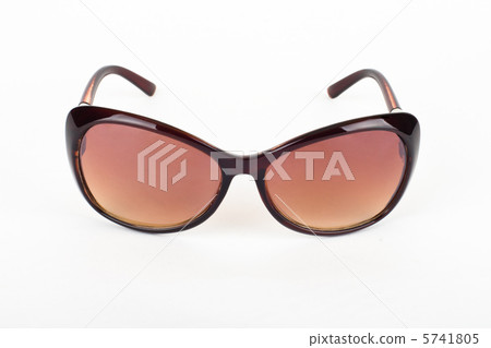 Brown sunglasses isolated on the white background Brown sunglasses isolated on the white background 5741805