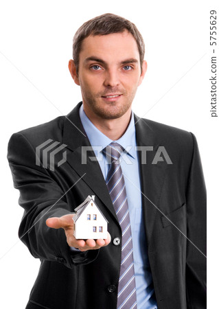 Man with toy house Man with toy house 5755629