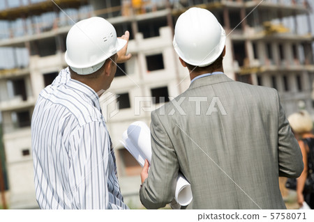 Backs of workers Backs of workers 5758071