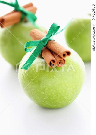 Blue apples and cinnamon sticks Blue apples and cinnamon sticks 5762496