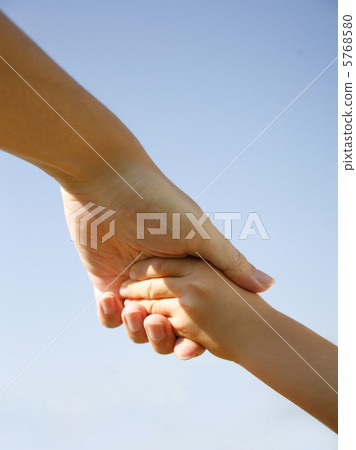 Parents and children holding hands 5768580