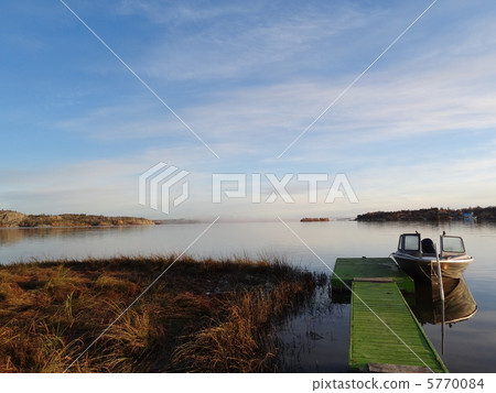 Lake and fog and motor boat Lake and fog and motor boat 5770084