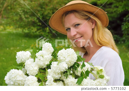Young woman with snowballs Young woman with snowballs 5773102