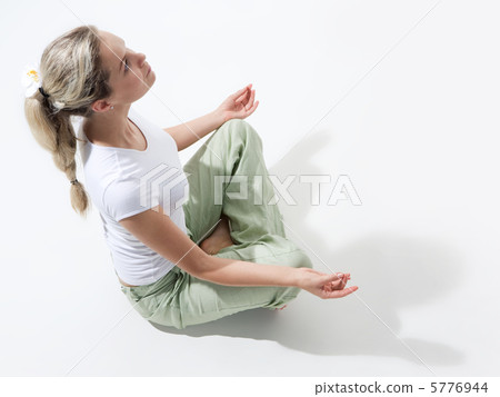 Woman meditating Woman meditating 5776944