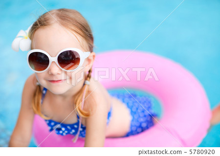 Little girl at swimming pool Little girl at swimming pool 5780920