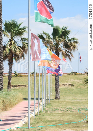 Different flags row.on  windsurfing station in Alacati, Turkey 5784366