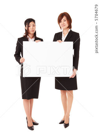 A woman with a whiteboard A woman with a whiteboard 5784679