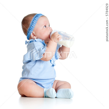 adorable baby girl drinking milk from bottle without help adorable baby girl drinking milk from bottle without help 5784929