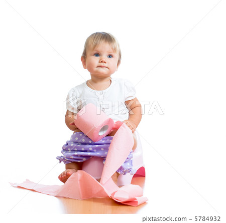 funny baby sitting on chamber pot with toilet paper roll funny baby sitting on chamber pot with toilet paper roll 5784932