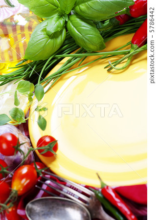 Fresh vegetables and empty plate (for your text) Fresh vegetables and empty plate (for your text) 5786442
