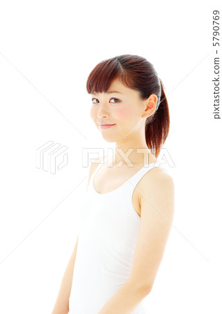 A beautiful woman in a tank top 5790769