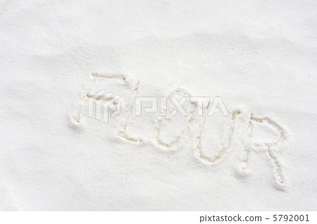 Word "flour" handwritten in flour Word "flour" handwritten in flour 5792001