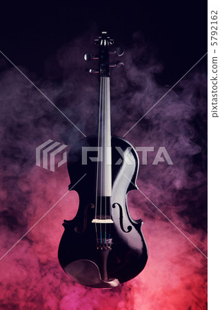 Elegant black violin in smoke 5792162
