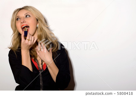 Cheerful young blond woman Cheerful young blond woman 5808418