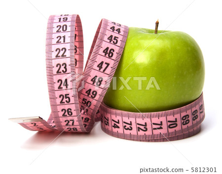 tape measure wrapped around the apple isolated on white backgro 5812301