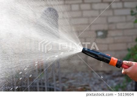 Water from a garden hose 5819604