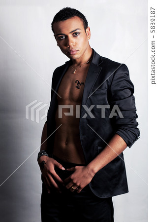 Gigolo. Modern elegant male in stylish clothing posing 5839187