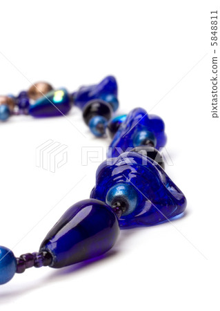 blue beads isolated on white background 5848811