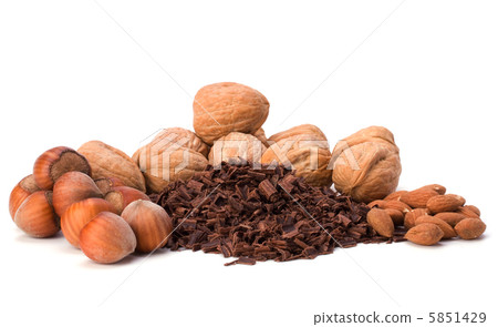 grated chocolate and nuts isolated on white background grated chocolate and nuts isolated on white background 5851429