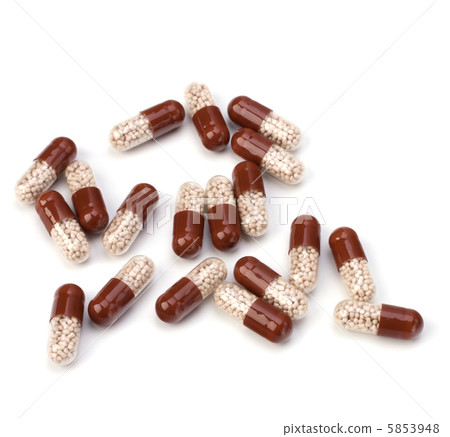 capsules isolated on white background capsules isolated on white background 5853948