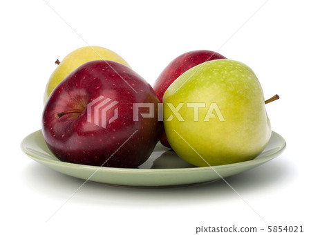 Apples pile on plate 5854021