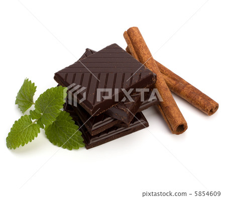 Chocolate bars stack and cinnamon sticks 5854609