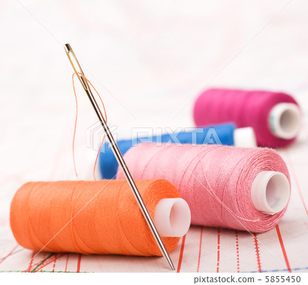 Spool of thread and needle. Sew accessories. Spool of thread and needle. Sew accessories. 5855450