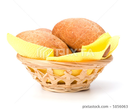 fresh warm rolls in breadbasket isolated on white background fresh warm rolls in breadbasket isolated on white background 5856063