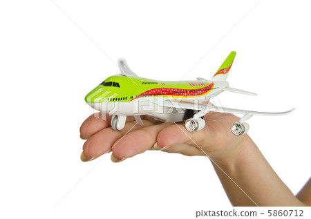 Hand holding toy airplane isolated on white Hand holding toy airplane isolated on white 5860712