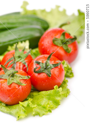 Cucumbers and tomatoes ready for salad Cucumbers and tomatoes ready for salad 5860715