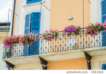 Nice balcony with fresh flowers Nice balcony with fresh flowers 5861662