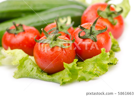 Cucumbers and tomatoes ready for salad Cucumbers and tomatoes ready for salad 5861663