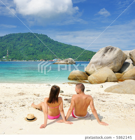 Couple on a beach 5862145