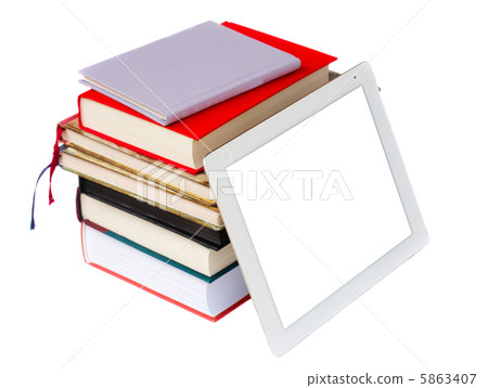 pile of books with modern tablet PC 5863407