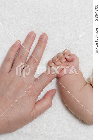 Cute baby hands and adult hands 5864809