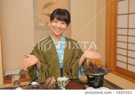 A woman who eats at an inn A woman who eats at an inn 5883563