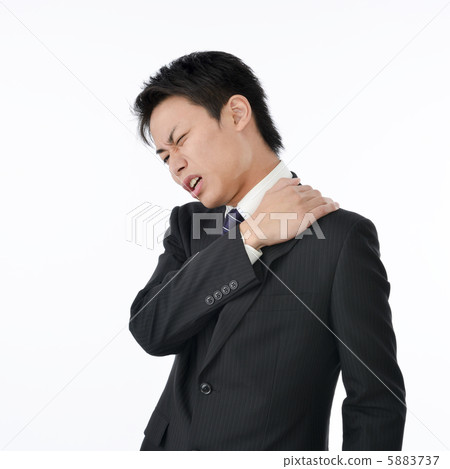 Businessman with stiff shoulders Businessman with stiff shoulders 5883737