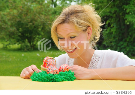Young woman and easter eggs Young woman and easter eggs 5884395