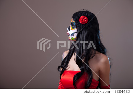 Profile view of Sugar skull girl in red dress 5884483