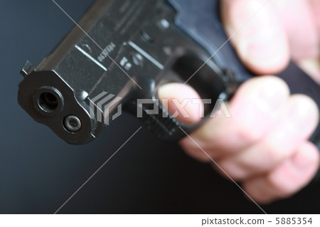 Hand with pistol 5885354