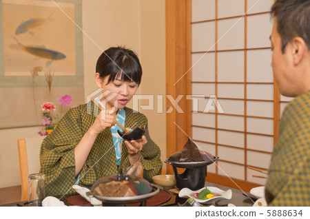 A woman dining in a hot spring A woman dining in a hot spring 5888634
