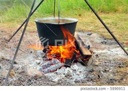 kettle over campfire 5890911