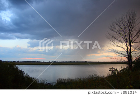 lake with rain in dusk lake with rain in dusk 5891014