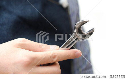 A man with a wrench 5892555