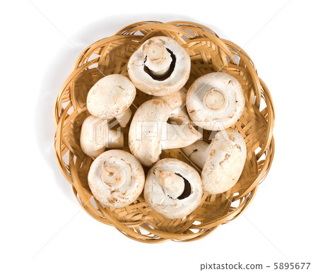 Mushrooms in a wooden basket 5895677