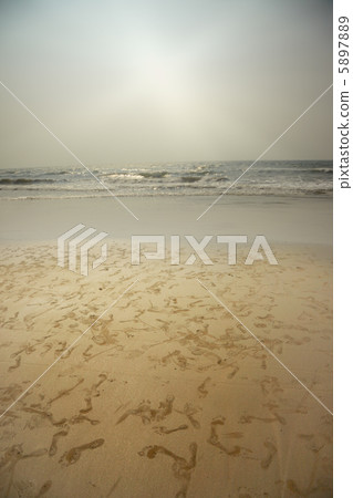 Footprints at the beach 5897889