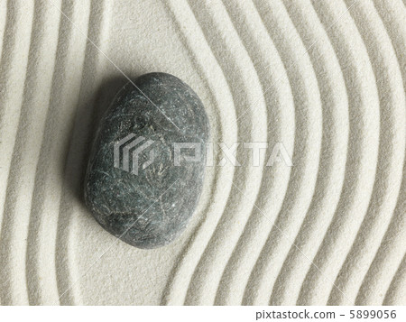 Zen stone in the sand 5899056