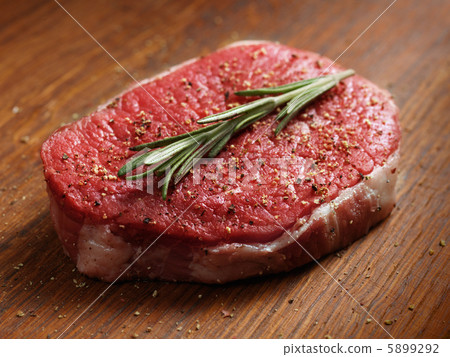 fresh raw steak with pepper and rosemary 5899292